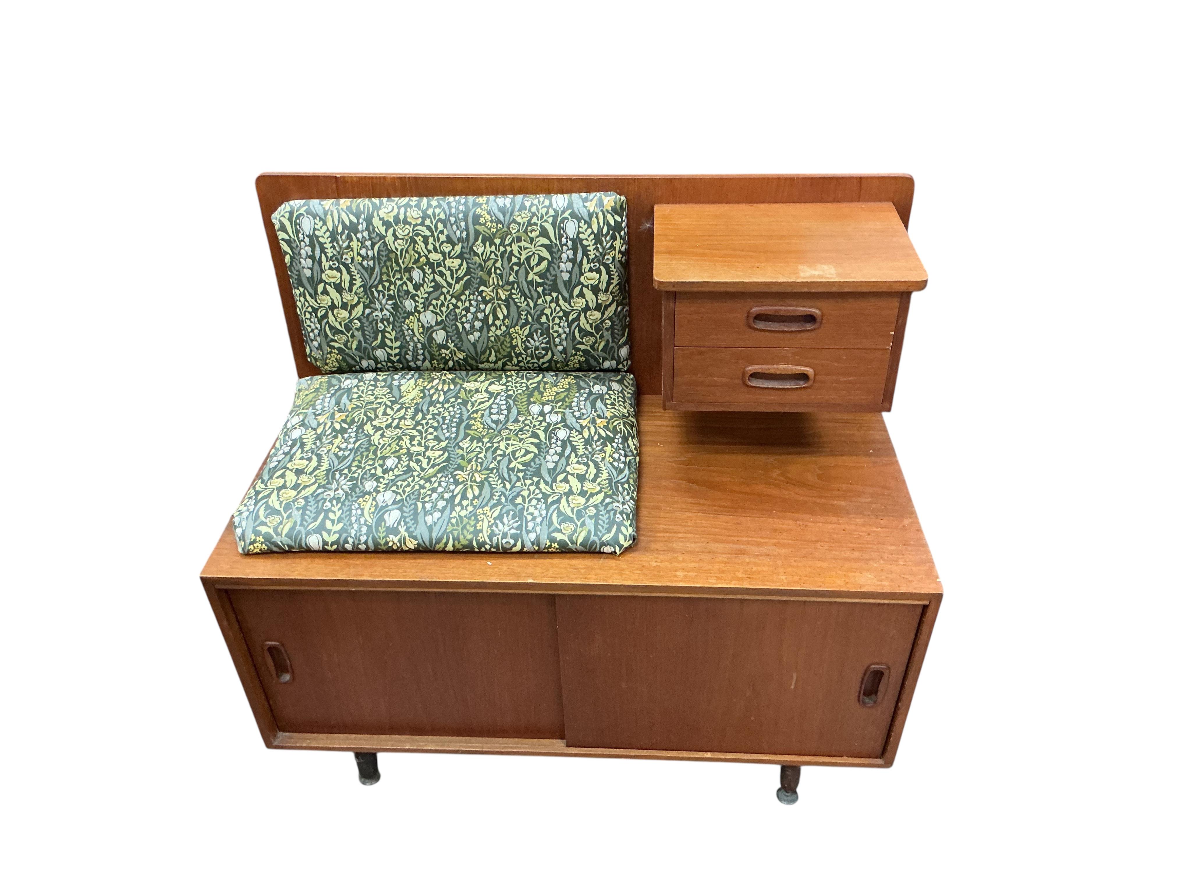 A mid century G Plan teak telephone table, width 84cm, depth 42cm, height 76cm